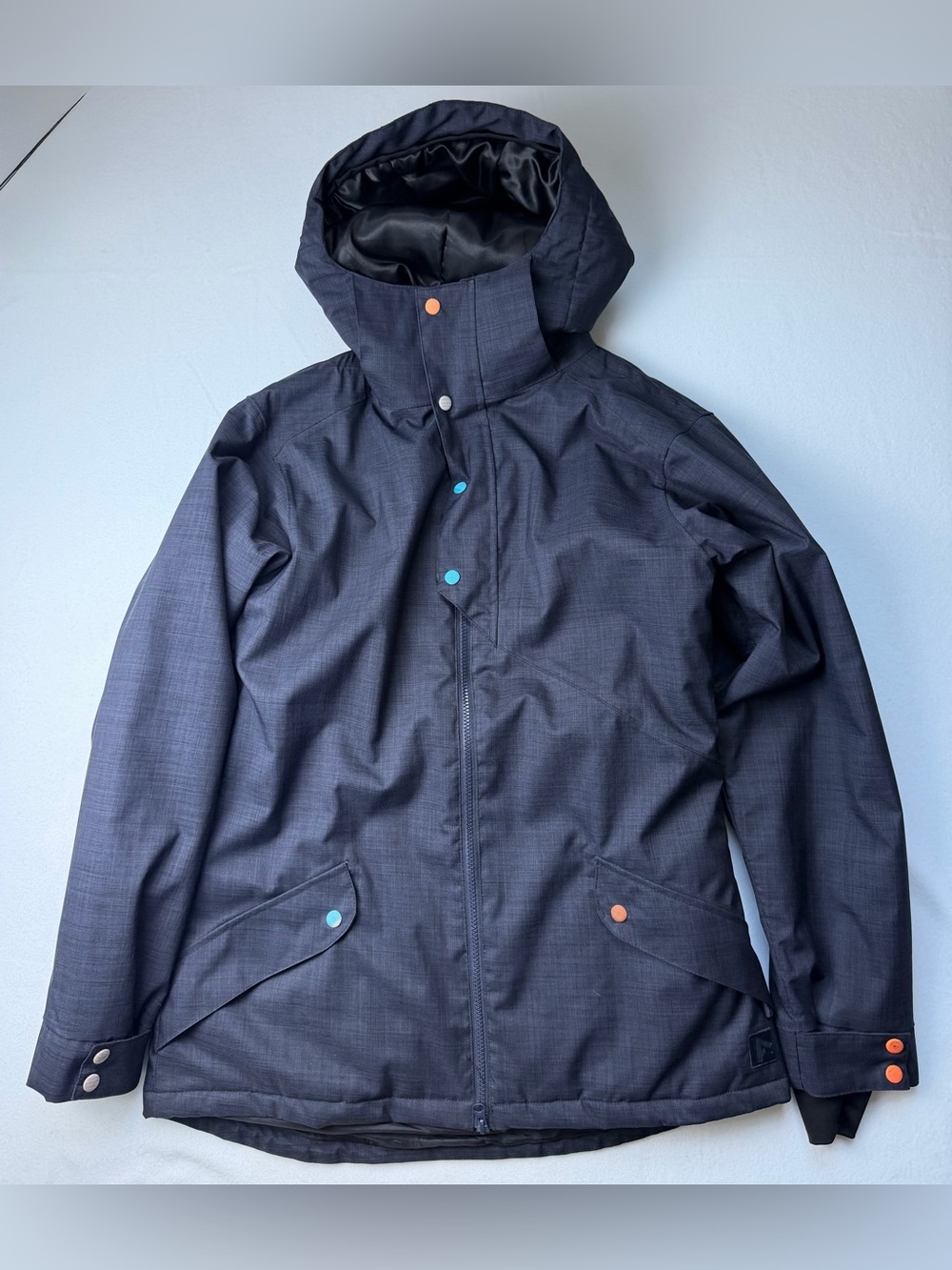 Anakie Women's Ski Jacket in Dark Navy with Orange & Light Blue Accents